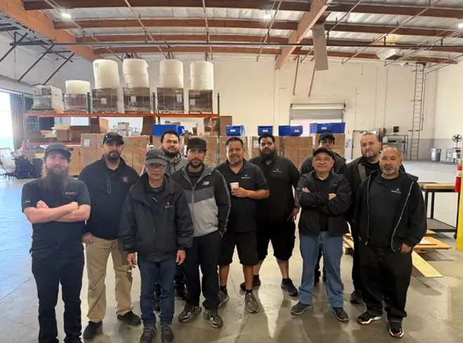 <i>The SmartSource LA team - new warehouse, same unstoppable energy. From left to right: Fernando Morales, Francisco Garcia, John Tran, Danny Aceituno, Anthony Baez, Israel Lopez, Raul Reynaga, Walter Erazo, Raul Ramirez, Alex Lizarraga, and Daniel Herrera. Those not pictured: Rodolfo Morales, Rafael Aguirre, Adrian Luna, and Felix Pastrana.</i>